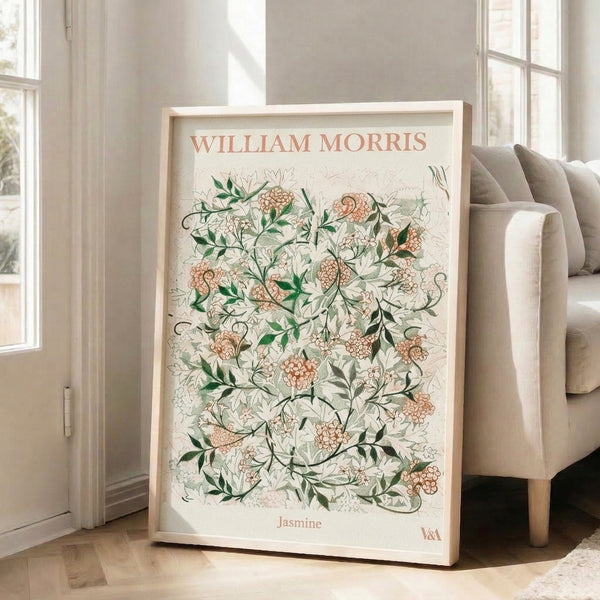 Framed Art Nouveau botanical print depicting graceful jasmine flowers and climbing vines against a cream background in muted coral and green tones.