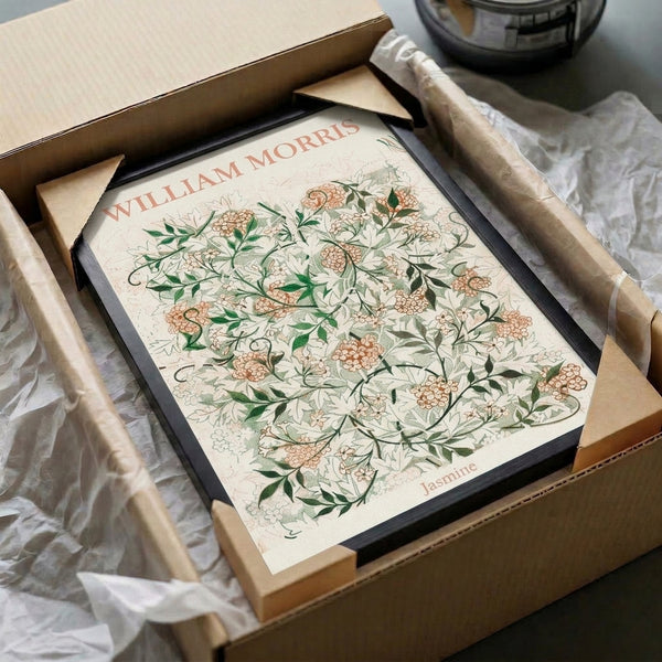 Framed Art Nouveau botanical print showcasing naturalistic jasmine flowers amid flowing vine patterns in coral, green, and neutral background colors.