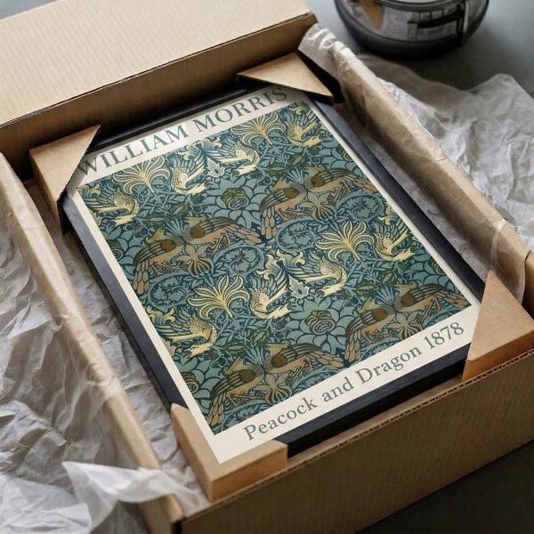 Antique-style decorative art print of an ornate peacock and dragon design with Art Nouveau botanical flourishes in dark blue and gold.