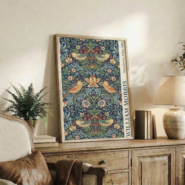 Vintage botanical art print with Art Nouveau style birds and strawberry plants in harmonious dark blue, sage green, and warm coral coloring.