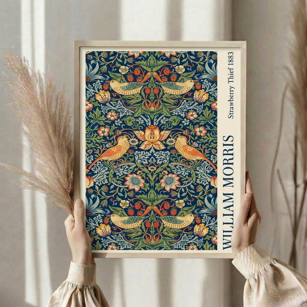 Classic Art Nouveau wall print with ornate strawberry thief birds and flowering foliage in rich jewel tones of blue, green, and coral-orange.
