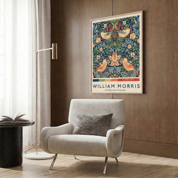 Vintage botanical art print in the Art Nouveau style with interlocking bird and strawberry imagery in cream, golden orange, and rich blue with decorative elegance.