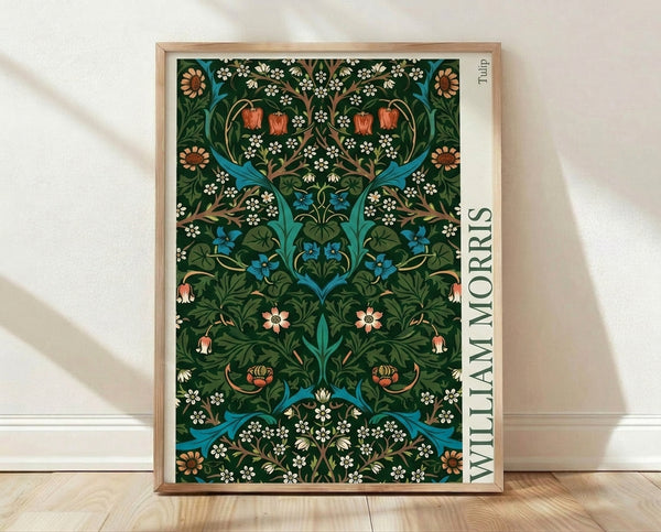 Art Nouveau framed poster featuring William Morris tulip and daisy floral pattern in forest green, turquoise, and coral red with ornamental gold accents on cream background.