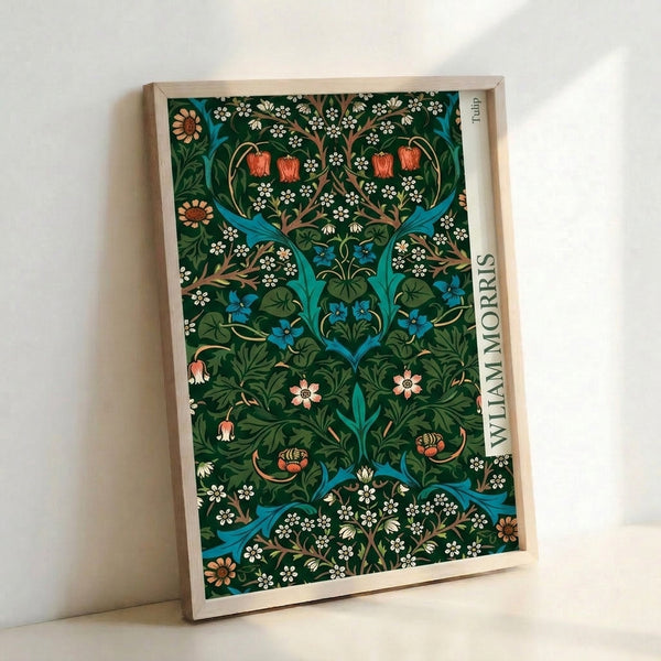 Framed Art Nouveau poster displaying elaborate William Morris tulip design with leafy tendrils in forest green, turquoise blue, and warm coral tones against cream.