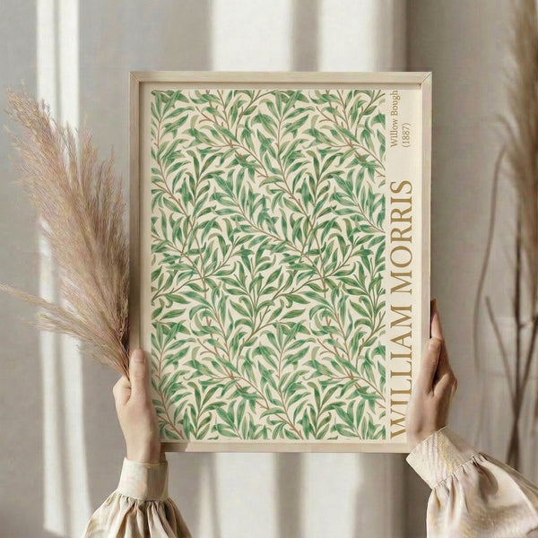 Framed wall art featuring ornamental willow leaves and branches in sage and olive green, classic Art Nouveau botanical composition.