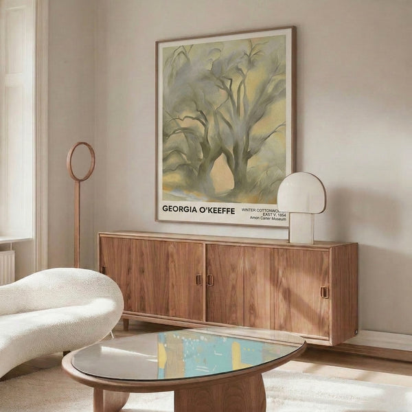 Art print in watercolor showing cottonwood trees stripped of leaves in winter, rendered in gentle warm tones and whites, creating a serene intimate mood.