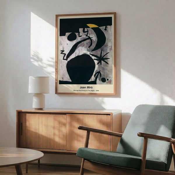Surreal abstract wall art depicting woman and bird forms in a contemplative nighttime setting using moody blues, blacks, and warm ochre accents.