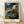 Impressionist painting of a woman bathing in a shallow tub, rendered in soft blues, creams, and ochre tones with a contemplative, intimate mood.