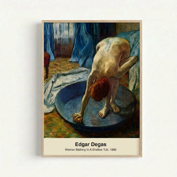 Framed impressionist art print depicting a solitary figure in a bathing tub, featuring pale blue water and naturalistic brushwork in muted grays and creams.