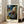Impressionist masterpiece featuring a woman in a shallow tub captured in a moment of quiet repose, rendered in luminous blues and ochre hues.