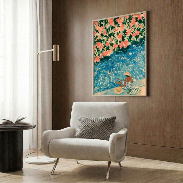 Nostalgic framed poster in Art Nouveau style showing a woman in elegant repose by the pool, surrounded by flourishing pink bougainvillea branches, rendered in warm coral, cool teal, and cream palette.