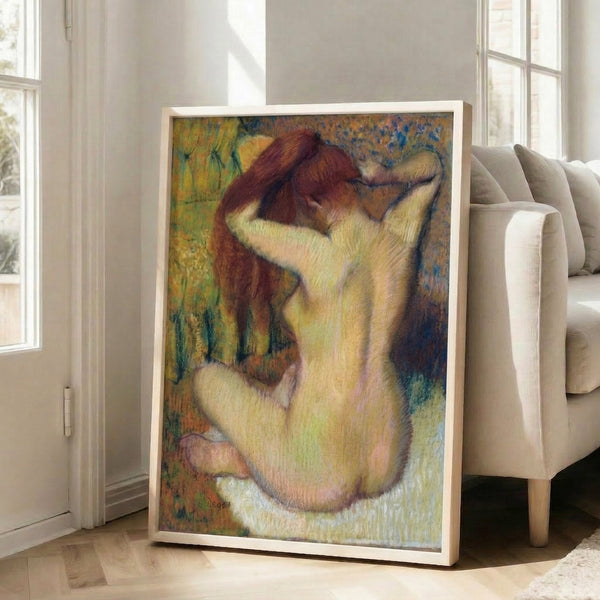 Impressionist-style framed artwork depicting a solitary figure combing long hair, composed in warm beige and brown hues with soft, contemplative mood.