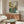 Soft impressionist watercolor depicting a private bathing moment, its palette of warm and cool tones creating introspective mood, displayed as a framed interior art print.