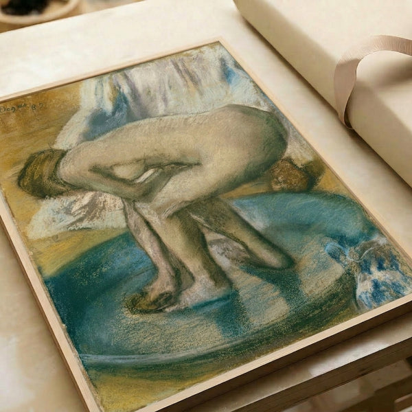 Intimate impressionist scene of a figure bathing, painted in impressionistic layers of cream, red, ochre, and blue-gray, shown as a framed poster on a wall.