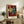 Contemporary framed print inspired by Matisse showing a stylized female figure in blue, white, and ochre with serene, introspective expression and clean geometric forms.