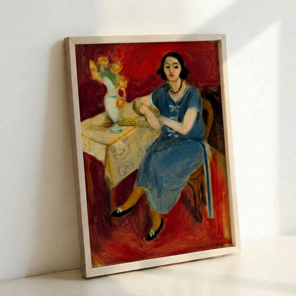 Framed poster of Femme en Bleu displaying elegant figure in cool blue palette with flowing, minimalist composition.