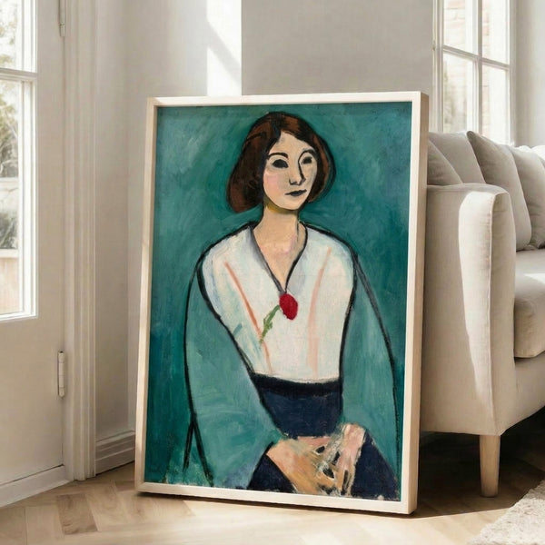 Matisse-inspired framed wall art depicting a woman with simplified green facial features and bold color blocking.