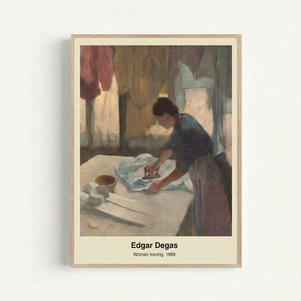 Degas masterpiece depicting a faceless woman concentrating on her ironing work, framed poster art featuring muted greens and warm earth tones characteristic of Impressionist style.