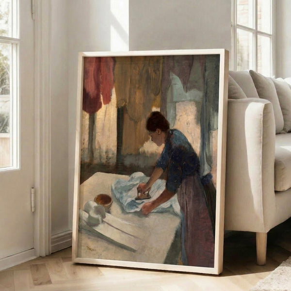 Woman absorbed in her ironing work, portrayed with impressionistic technique using subdued tones and delicate color harmonies, displayed as framed poster.