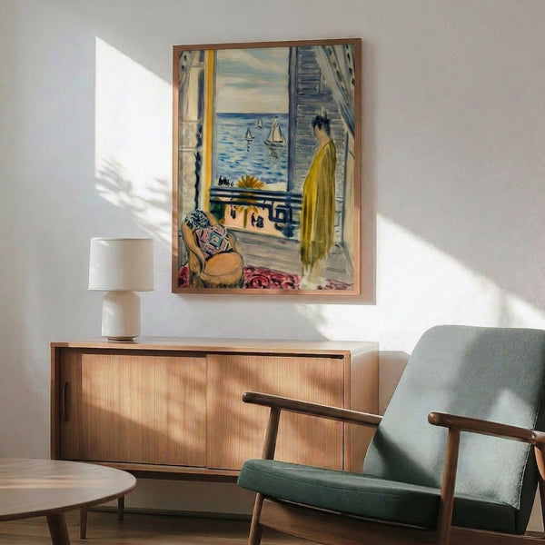 Art print capturing a contemplative interior with a figure and open window, glowing in warm and cool color contrasts of yellow, blue, pink, and green.