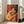 Matisse-inspired framed poster showing an elegantly posed woman clutching a guitar amid abstract shapes in warm and cool tones.