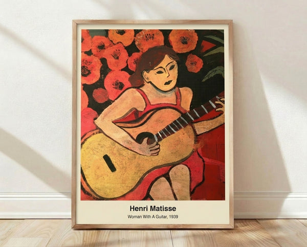 Abstract framed poster of a woman with a guitar in ochre, blue, and red tones, inspired by Matisse's playful modern style.