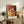 Contemporary poster displaying an abstract woman musician with guitar in ochre and vibrant blue, perfect for chic home décor.