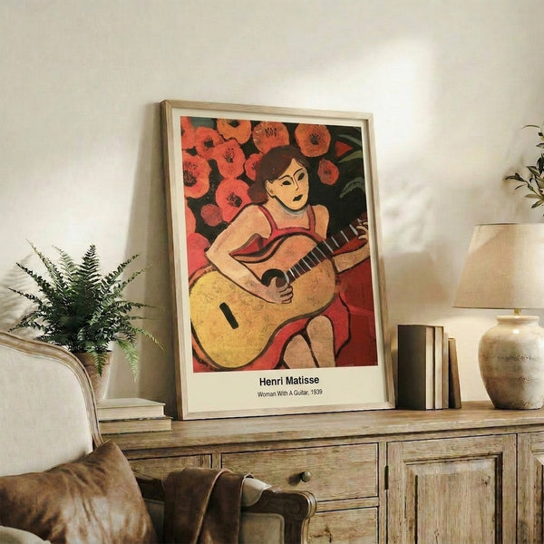 Contemporary poster displaying an abstract woman musician with guitar in ochre and vibrant blue, perfect for chic home décor.