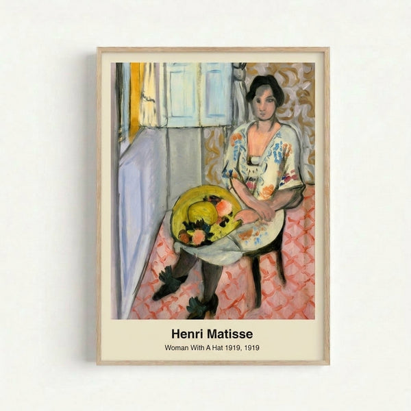 Modernist portrait featuring a woman's face and hat composition in vibrant orange, pink, and blue hues with loose, expressive brushwork; wall-mounted art print.