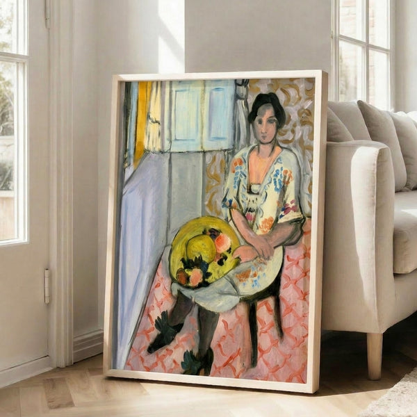 Expressive portrait artwork showing a woman in a hat, rendered in characteristic Fauvist colors of pink, blue, and green with gestural, artistic brushstrokes.