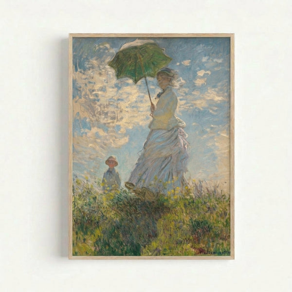 Framed art print depicting Madame Monet and her son strolling through a flowering field under an open parasol, in luminous impressionist style.