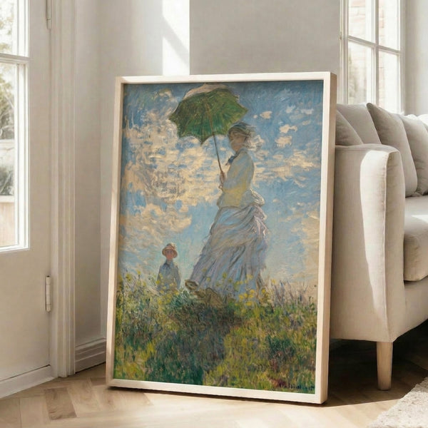 Wall art print of two figures walking through a blooming field, one holding a parasol, painted in dreamy impressionist palette of light blues and greens.
