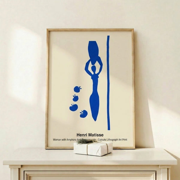 Framed contemporary wall art of a graceful figure with pomegranate and amphora in muted ochre and crimson tones, inspired by Matisse cutout technique.