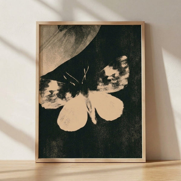 Framed vintage sepia moth study with ethereal Art Nouveau design, featuring delicate wings and mysterious dark academia aesthetics in cream and black tones.