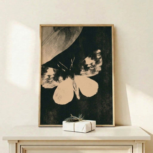 Antique-style sepia poster of an ornate moth figure with flowing Art Nouveau linework, capturing a timeless and ethereal mood in warm tan and cream hues.