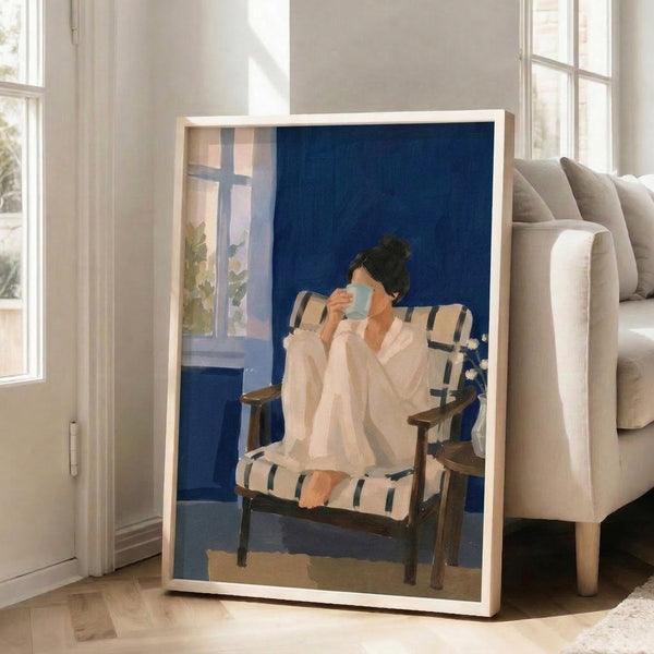 Introspective morning moment framed as wall art: a woman savoring her coffee cup in a minimalist interior with soft botanical elements and a warm beige and pink palette.