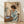 Watercolor poster of a contemplative woman holding a coffee mug by a sunny window, with an open book and potted plant nearby, in soft cream, teal, and sage tones.