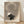 Minimalist poster art featuring a solitary woman with umbrella in soft taupe and cream tones, evoking a serene, contemplative mood in modern Japandi style.
