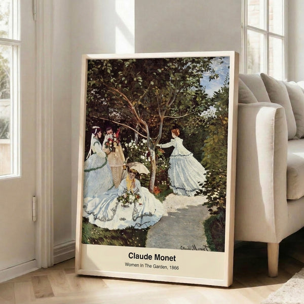 Framed impressionist garden painting showing gracefully posed figures surrounded by blooming flowers in soft whites, greens, and ethereal golden hues.