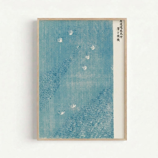 Atmospheric vintage ukiyo-e style poster depicting rain-swept waterfowl and aquatic plants in soft cream and teal hues, displayed as a framed print.
