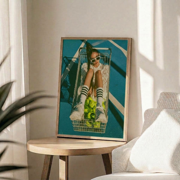 Retro-chic framed art print with a playful scene of a figure in oversized sunglasses and vibrant sneakers maneuvering a shopping cart across a geometric tennis court background in bright Y2K colors.