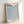 Modern abstract pattern artwork with rhythmic geometric forms in cream, steel blue, and white tones, hypnotic and contemplative wall art.