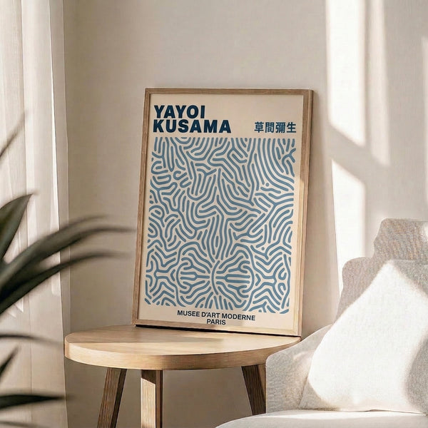 Abstract modern poster with interlocking lines forming hypnotic patterns in cream, white, and steel blue tones, striking minimalist wall art.