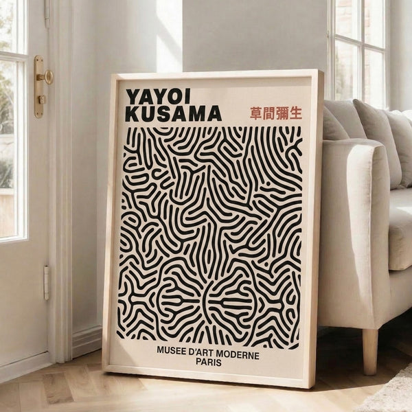 Modern abstract print featuring hypnotic radiating patterns and flowing lines in a serene palette of cream, black, and burnt orange.