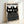 Framed print showing black cats with intricate white polka-dot details and expressive eyes against cream background, combining contemporary minimalism with Japanese woodblock sensibilities.