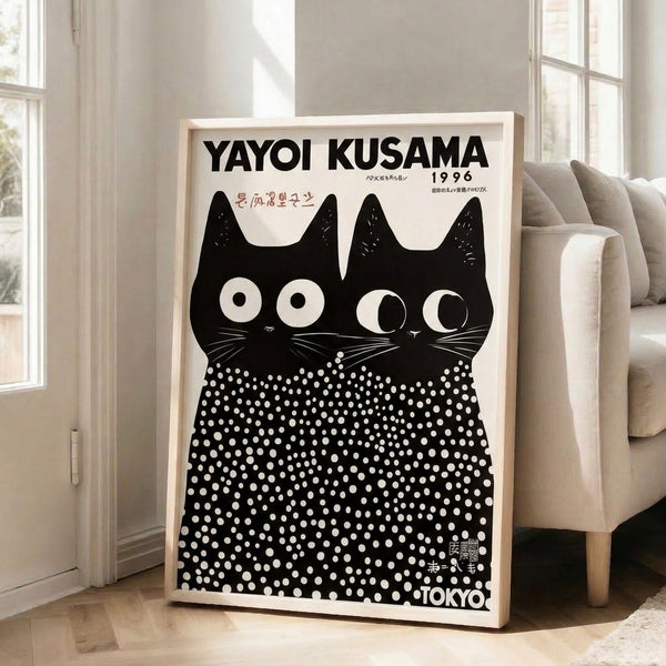 Modern poster of black cats rendered with haunting white dot overlays and striking gaze, capturing a whimsical yet bold artistic vision in black and cream tones.