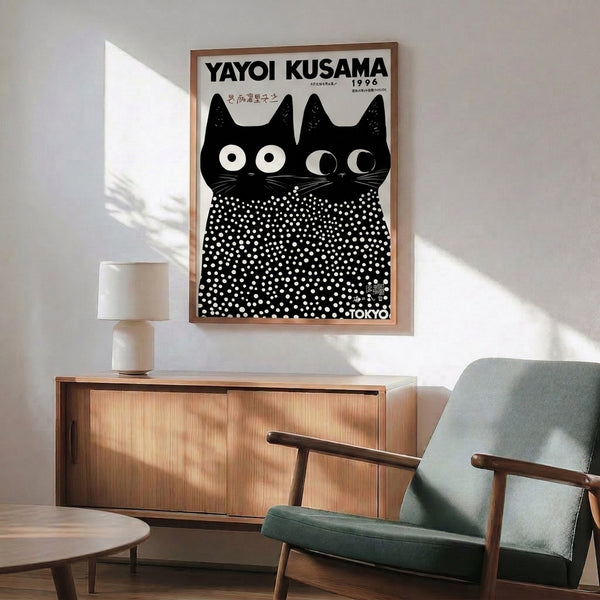 Wall art print featuring black cats with hypnotic white dot embellishments and watchful expressions, merging minimalist aesthetics with Japanese creative heritage.