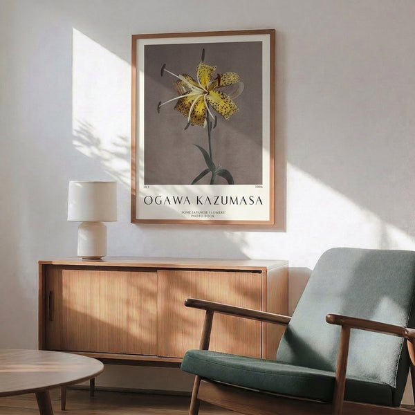 Framed vintage-inspired lily poster featuring naturalistic detail and a refined color palette of cream, taupe, dark brown, and soft yellow tones.