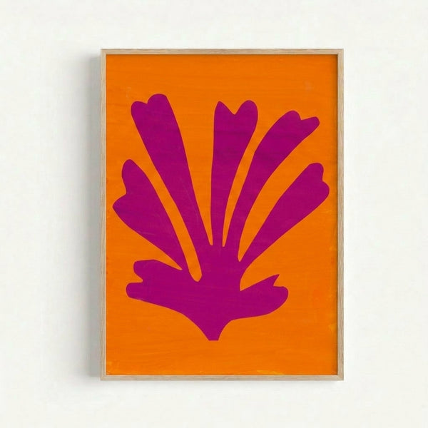 Minimalist framed art print featuring organic shapes in yellow and pink, evoking mid-century abstract paper-cut aesthetics.