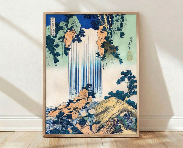 Japanese woodblock print of Yoro Waterfall cascading down a misty mountainside surrounded by towering trees and rocky cliffs in deep blue, cream, and forest green tones.